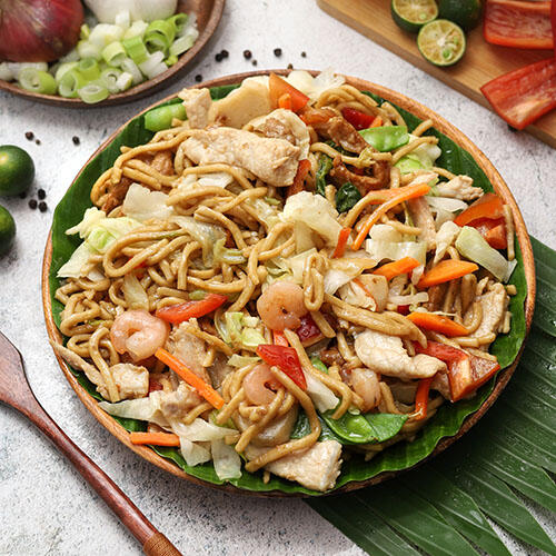 Pancit Canton Filipino Food Photo Set Pancit Canton Filipino stock photo pack with plated and ingredient-rich images, perfect for menu design, food flyers, and brand visuals
